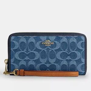 Coach Long Zip Around Wallet
In Signature Denim